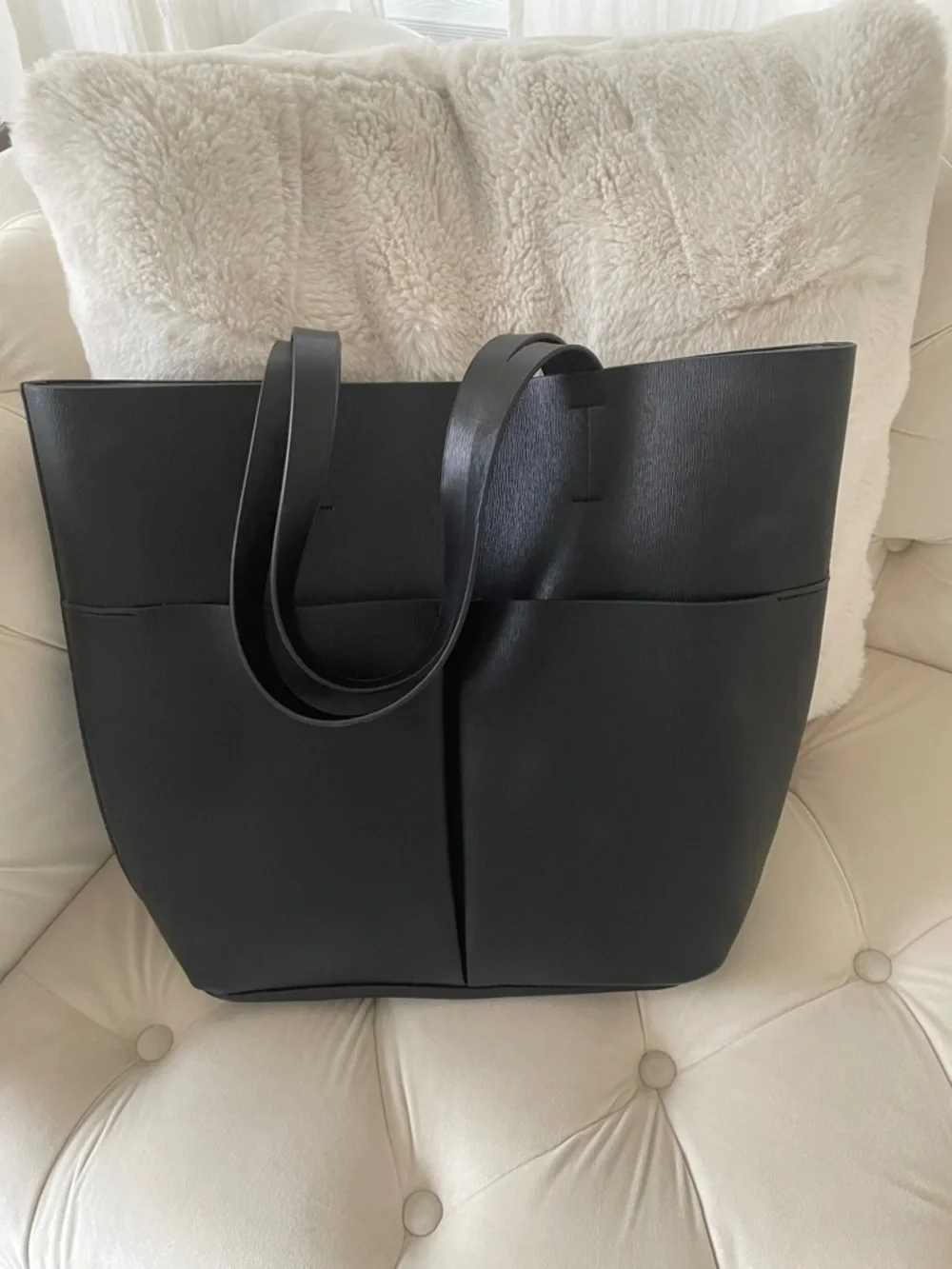 Neiman Marcus black faux leather tote bag with front pockets